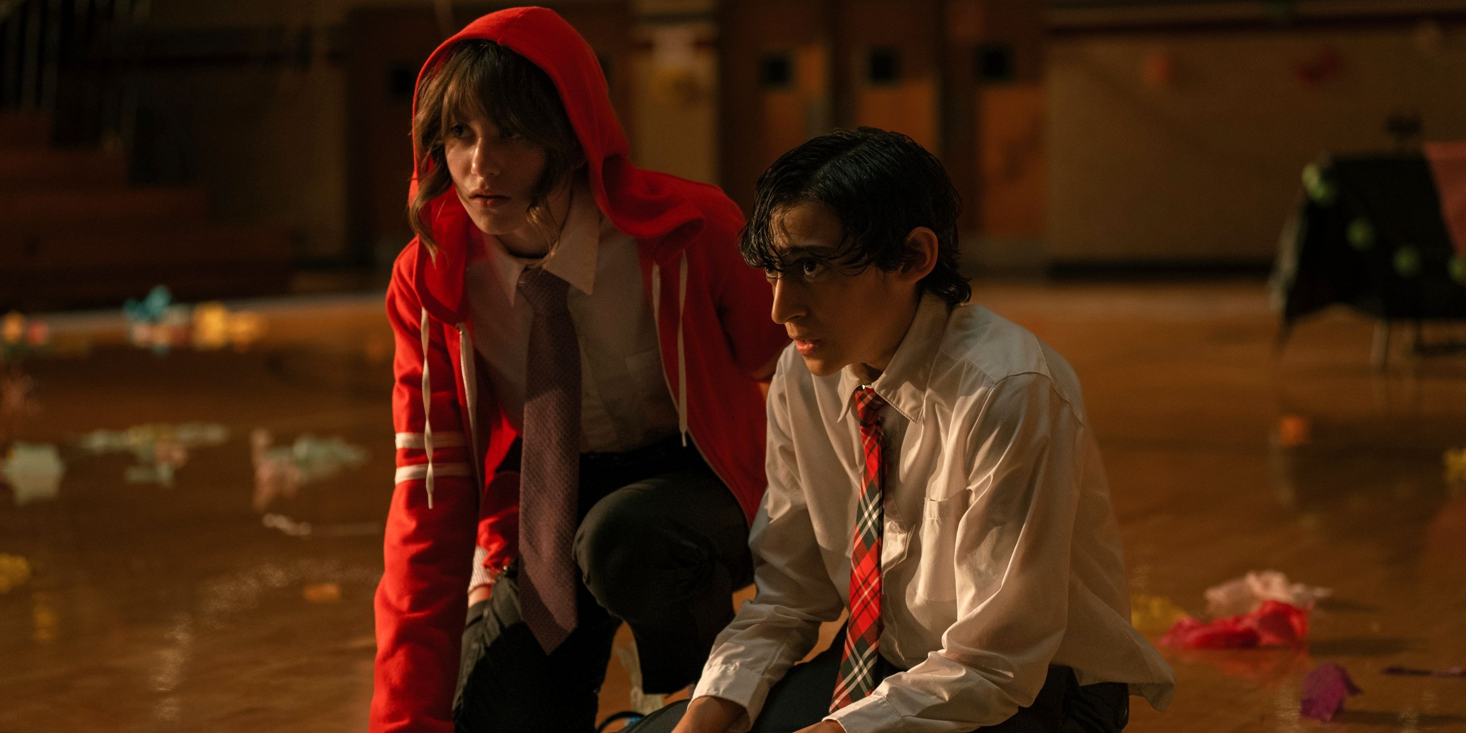 Lucian-River Chauhan as Ben and Abigail Pniowsky as Max wearing Ben's red hoodie in the Apple TV+ series Me