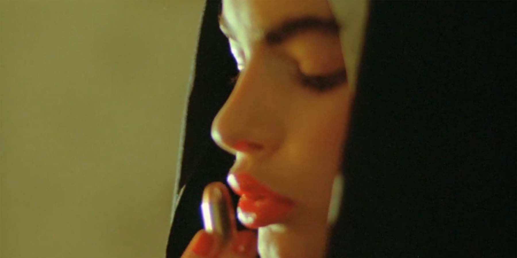 Zoë Lund kisses a bullet in Ms .45