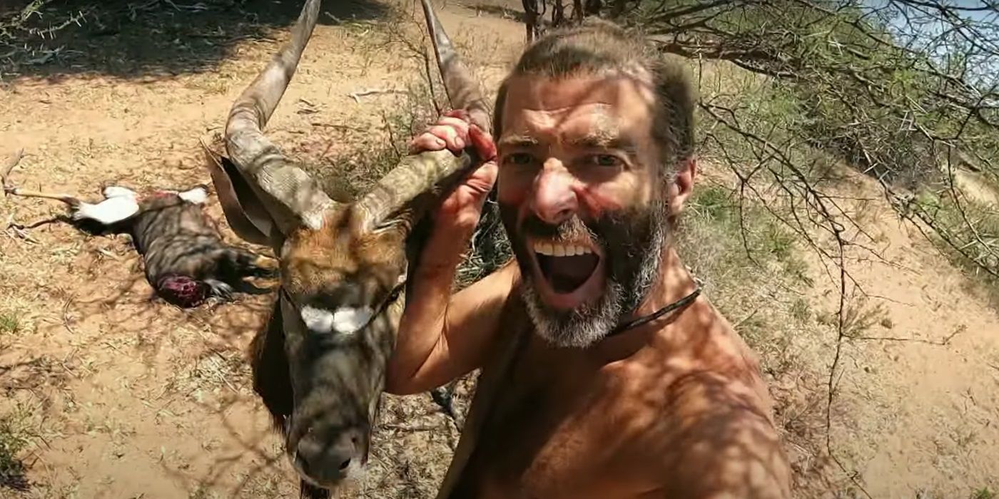 A contestant carrying the head of a dead animal in Naked and Afraid: Last One Standing Season 2.