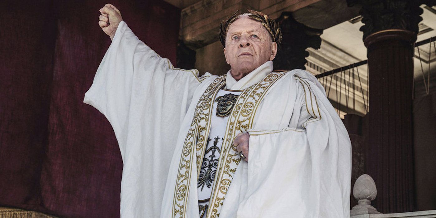 Anthony Hopkins as Emperor Vespasian raising his fist in Those About to Die. 