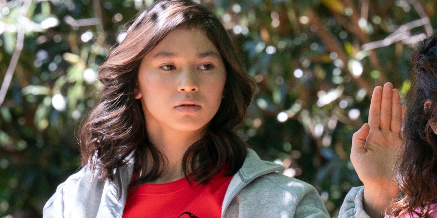 Oona O&rsquo;Brien as Devon Lee holding a hand up in Cobra Kai Season 6 Part 1.