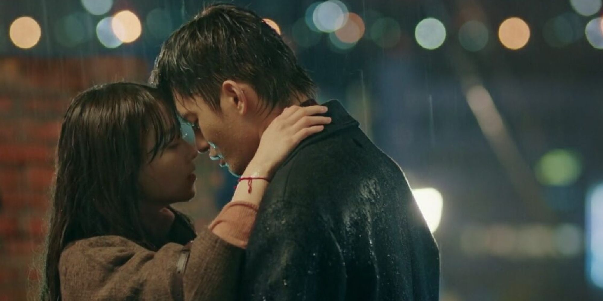 Park Bo-young and Seo In-guk kissing in the rain in Doom at Your Service