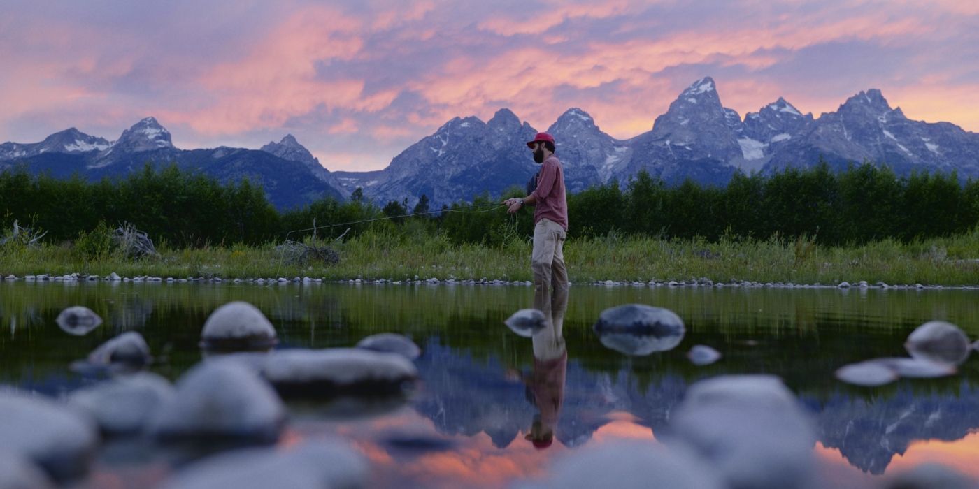 Ben Coleman as Max fishing in Peak Season