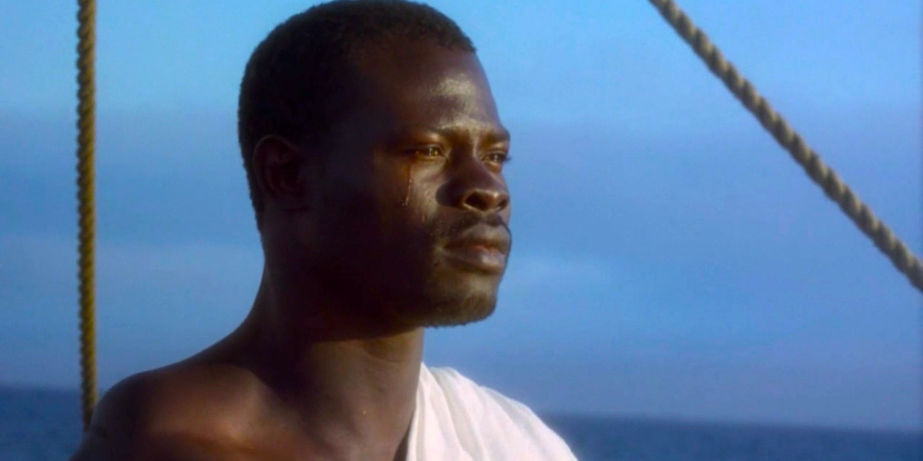 Joseph Cinqué looks emotional as he stares out at the horizon in Amistad.