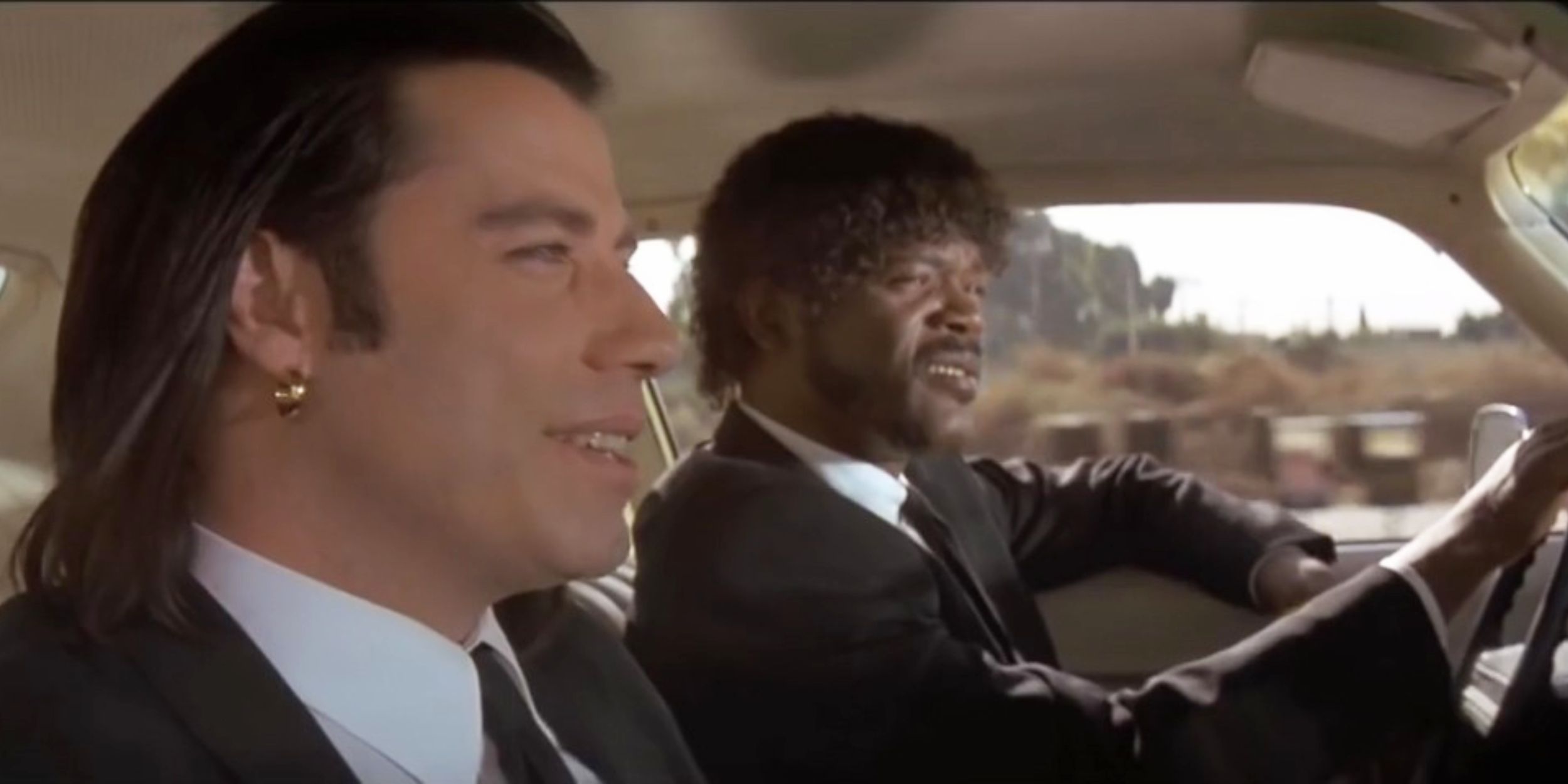 The Royale with Cheese conversation in a car in Pulp Fiction