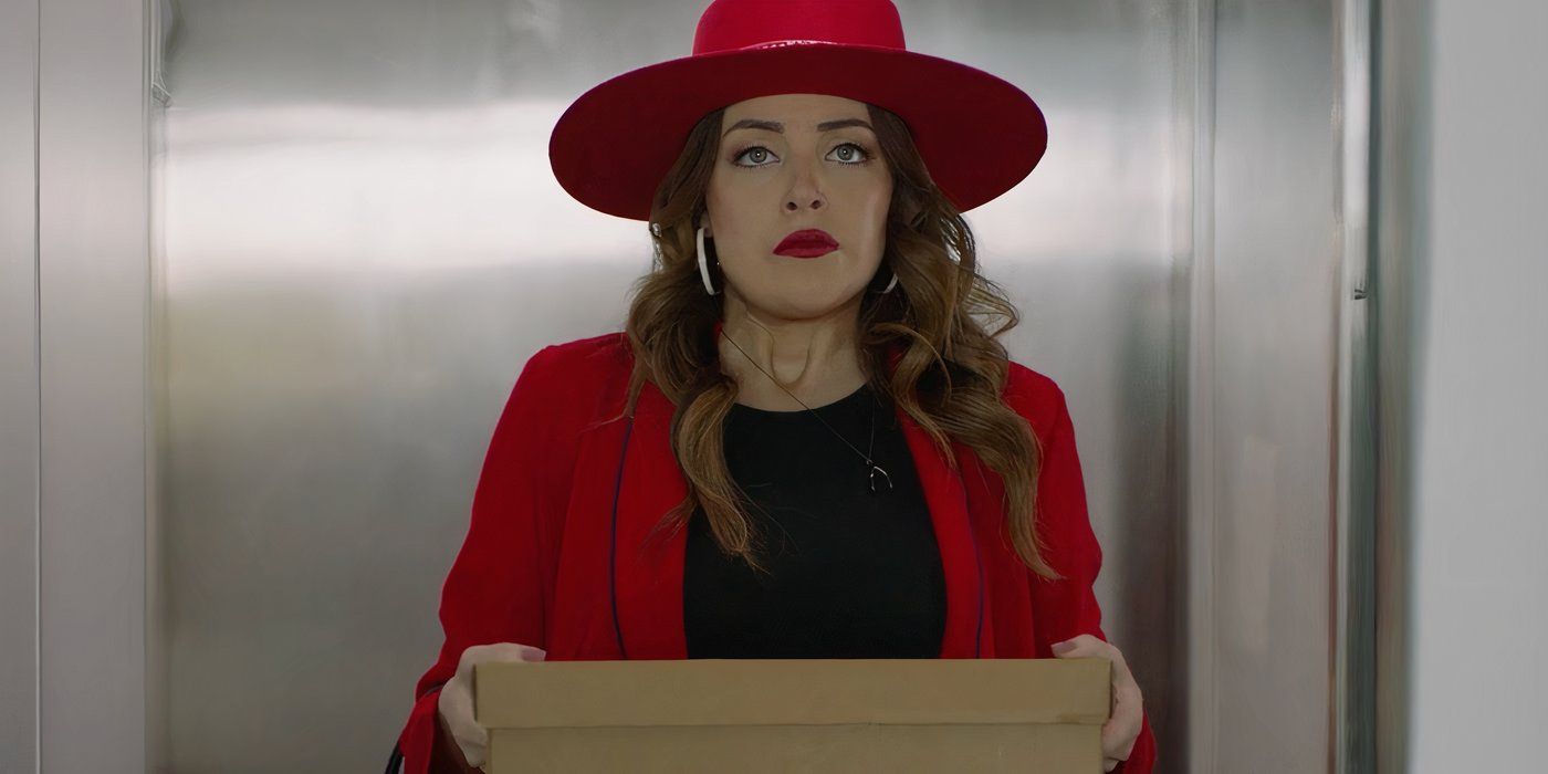 Elizabeth Gillies as Ruby in 'Spread' wears a red hat and jacket and collects her things after being fired from work