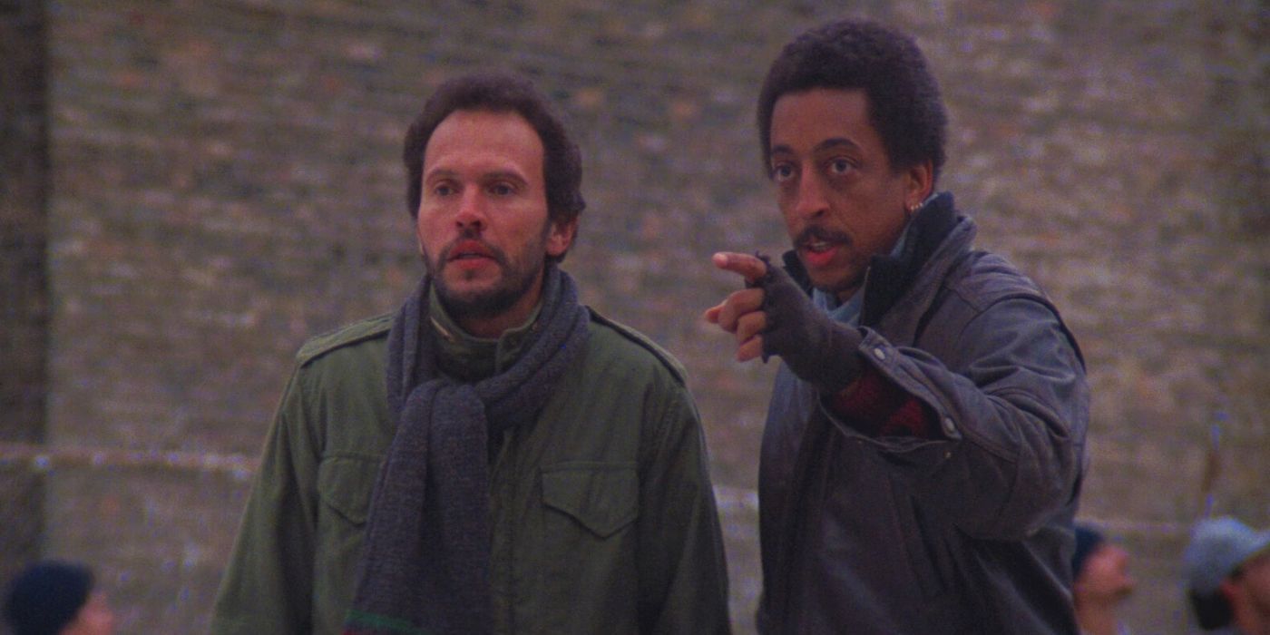 Billy Crystal and Gregory Hines, as Detective Danny Costanzo and Ray Hughes, spot a familiar criminal in Running Scared.