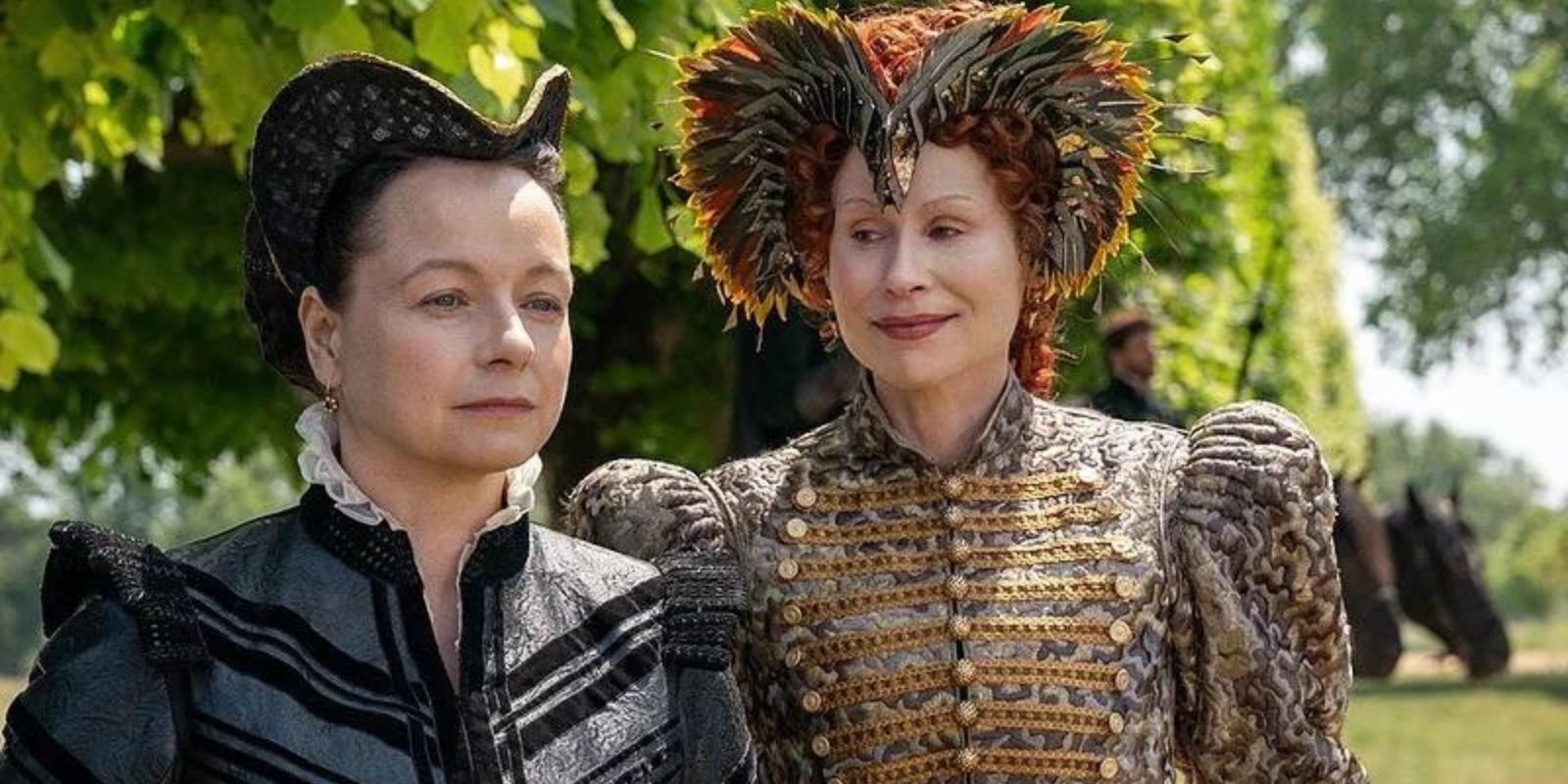 Catherine de' Medici and Queen Elizabeth II walking through a garden in The Serpent Queen Season 2