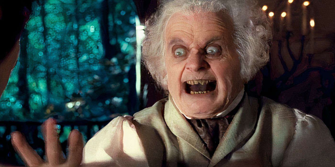 Still from Fellowship of the Ring of Bilbo, played by actor Ian Holm looking scary.