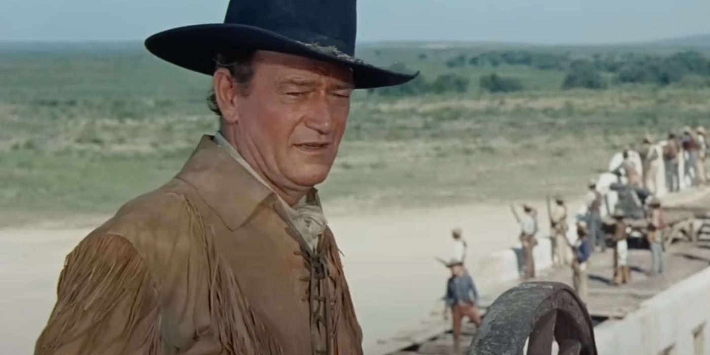 Davy Crockett (John Wayne) looking at a person offscreen in The Alamo (1960).