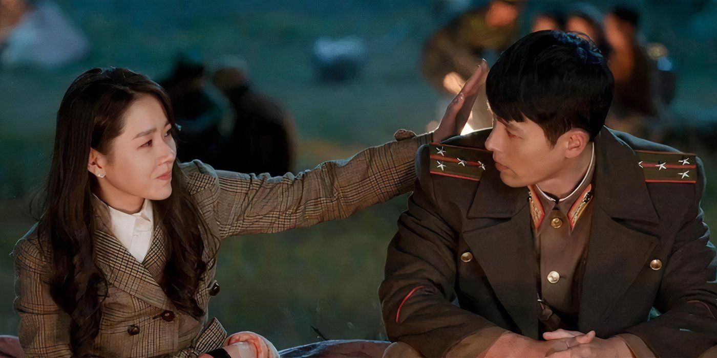 Se-ri patting Jeong-hyeok near a campfire, Crash Landing on You-1
