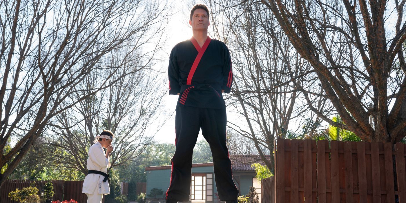 Sean Kanan as Mike Barnes standing at the center of the Miyagi-do dojo in Cobra Kai Season 6 Part 1.