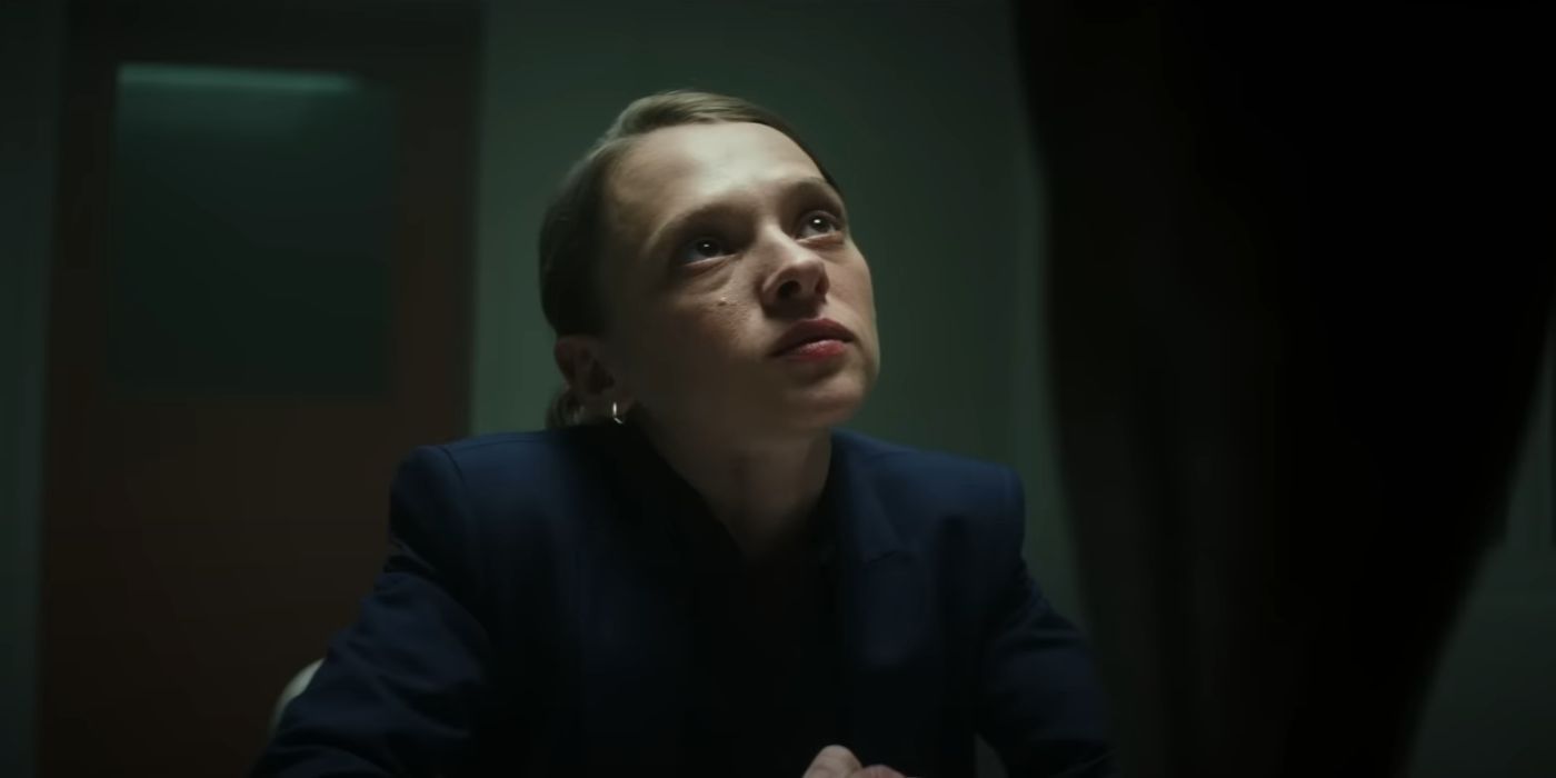 Shira Haas sitting down while looking up at another person in Captain America: Brave New World.