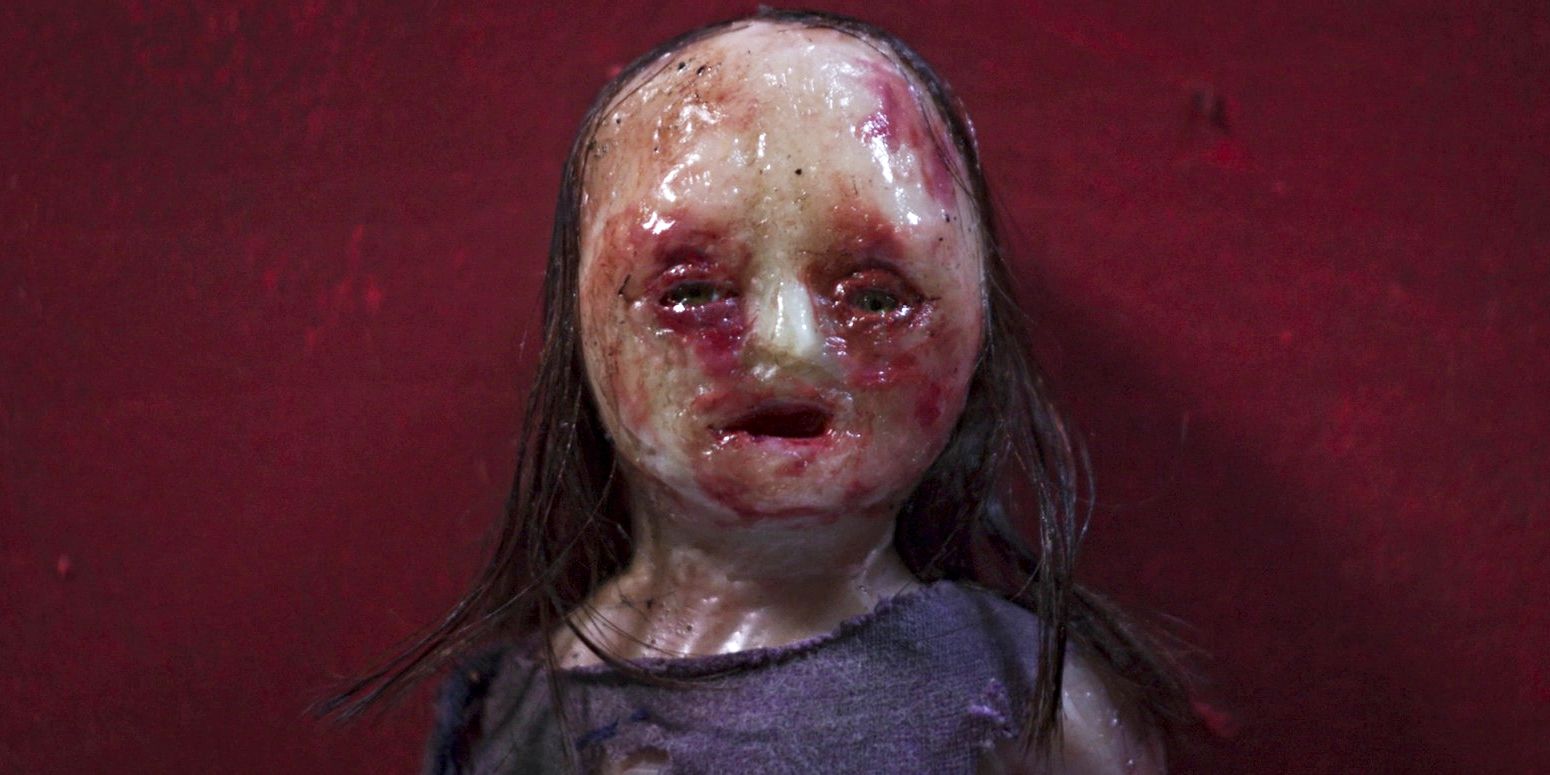 Little girl puppet staring at the viewer in a close up shot of Robert Morgan&rsquo;s Stopmotion film