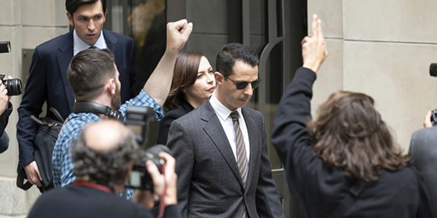 Kendall Roy (Jeremy Strong) departs the building, charging through reporters and onlookers while tailed by Karolina (Dagmara Dominczyk) and Greg (Nicholas Braun) in 'Succession' Season 3, Episode 1 "Secession" (2021).