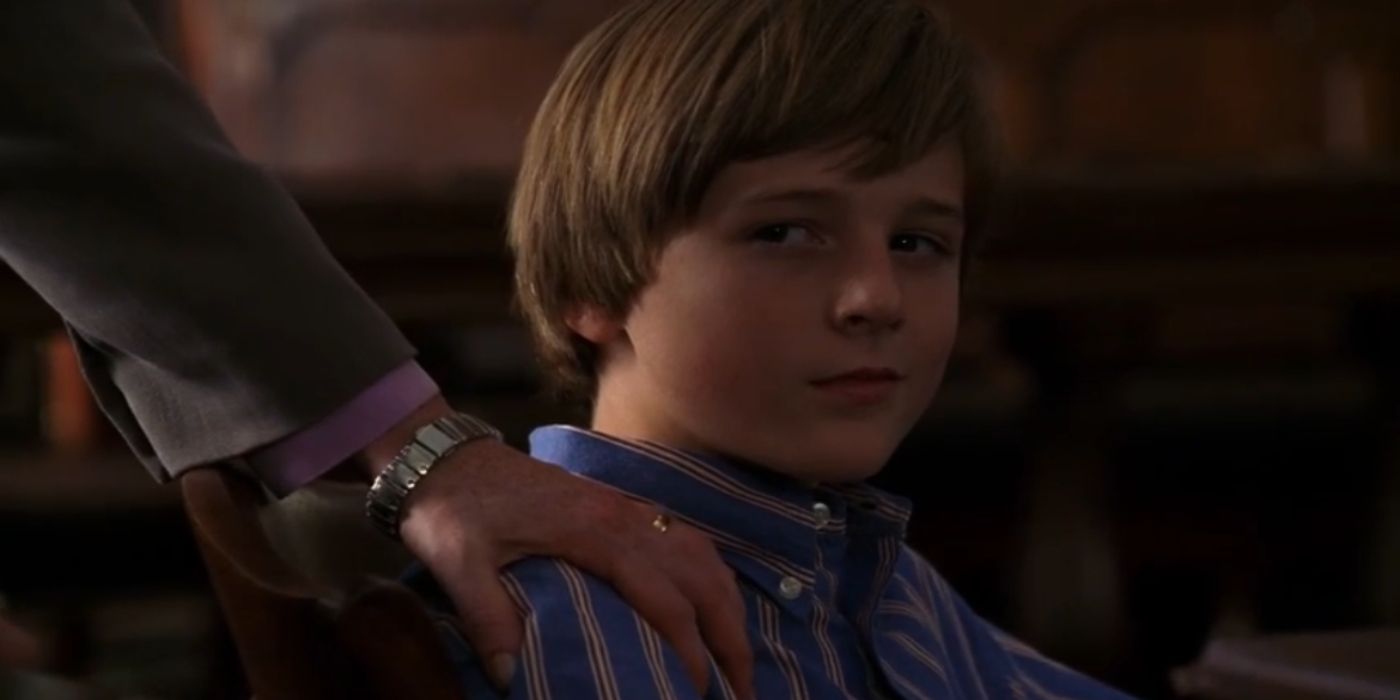 Jordan Garrett as Jake in SVU smiling menacingly 