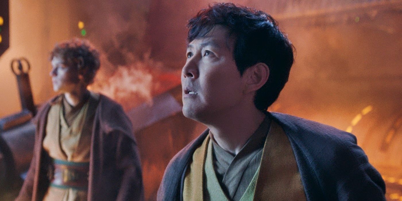 Lee Jung-jae and Dean-Charles Chapman stand among the flames in The Acolyte 