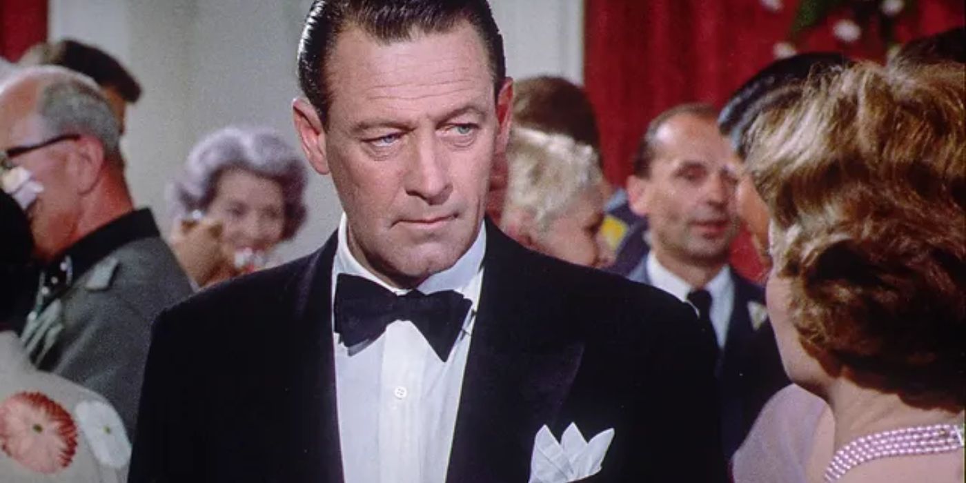 Erik Ericson looking intently at a woman in The Counterfeit Traitor