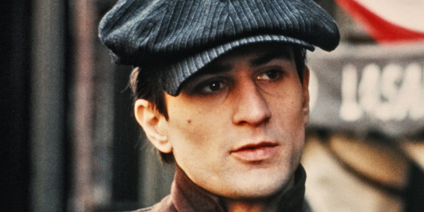 Robert De Niro as a young Vito Corleone looking at a person offscreen in The Godfather Part II