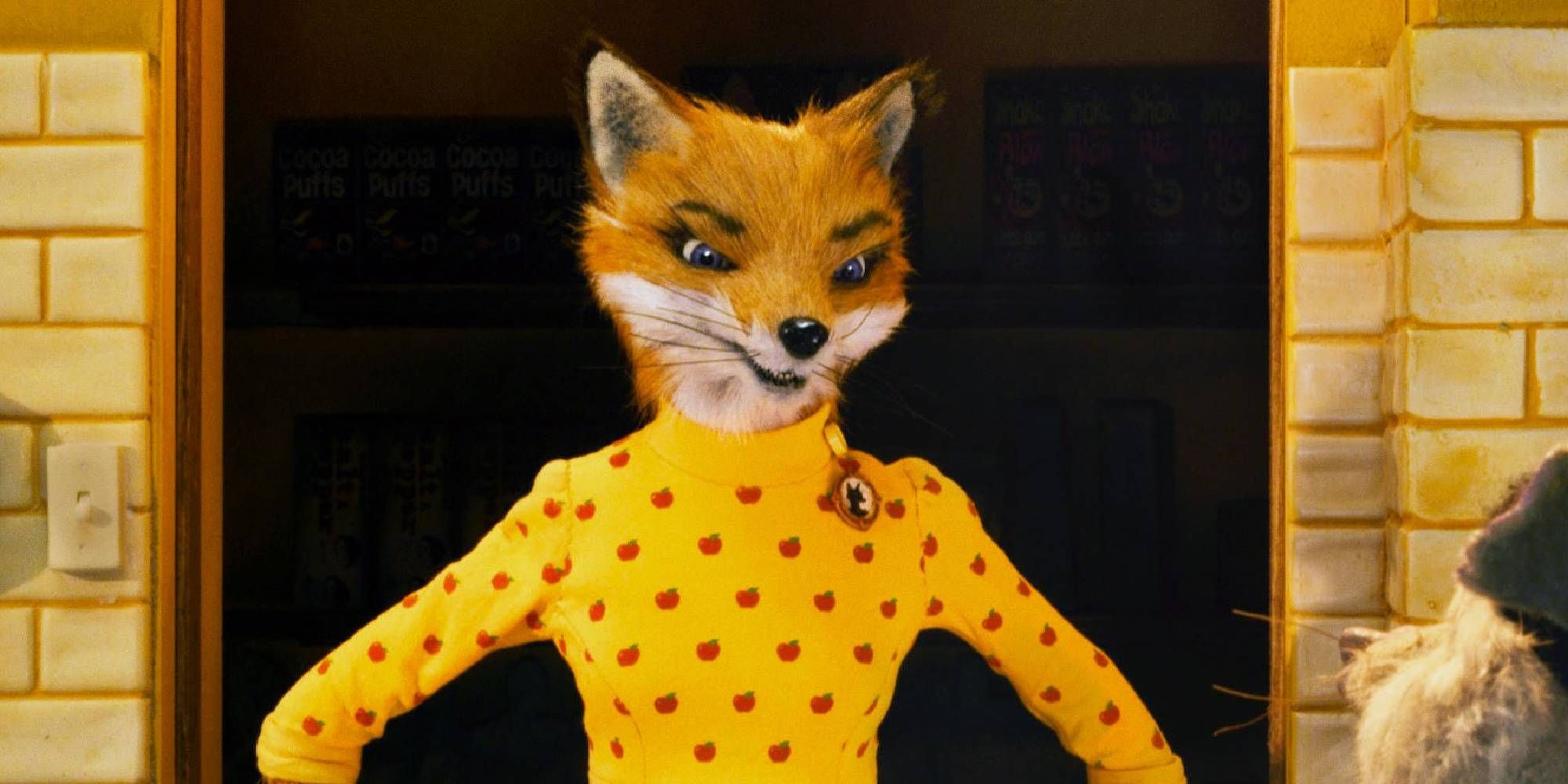 The mom in Fantastic Mr. Fox rests her hands in her wrist and looks upset.