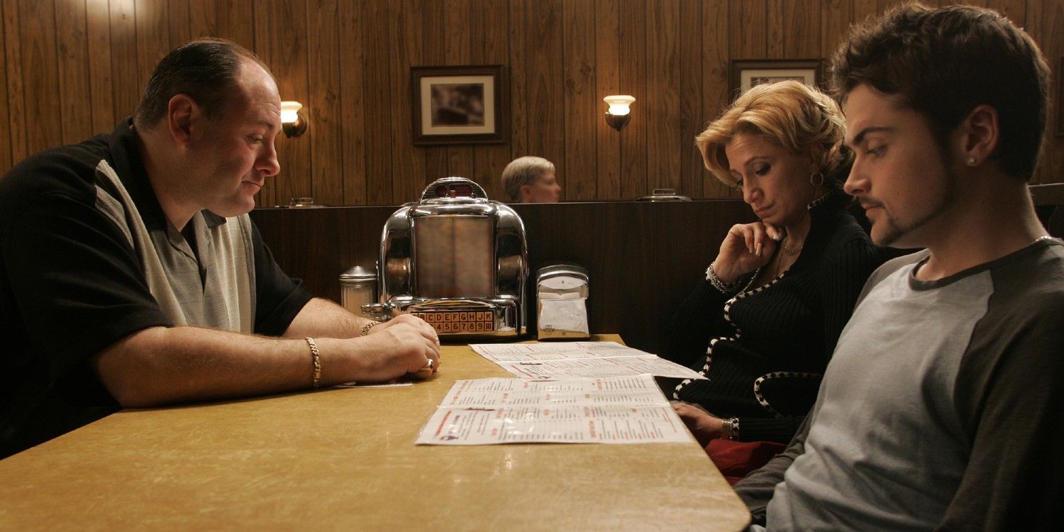Tony, Carmela, and A.J. look at menus in the finale of The Sopranos.
