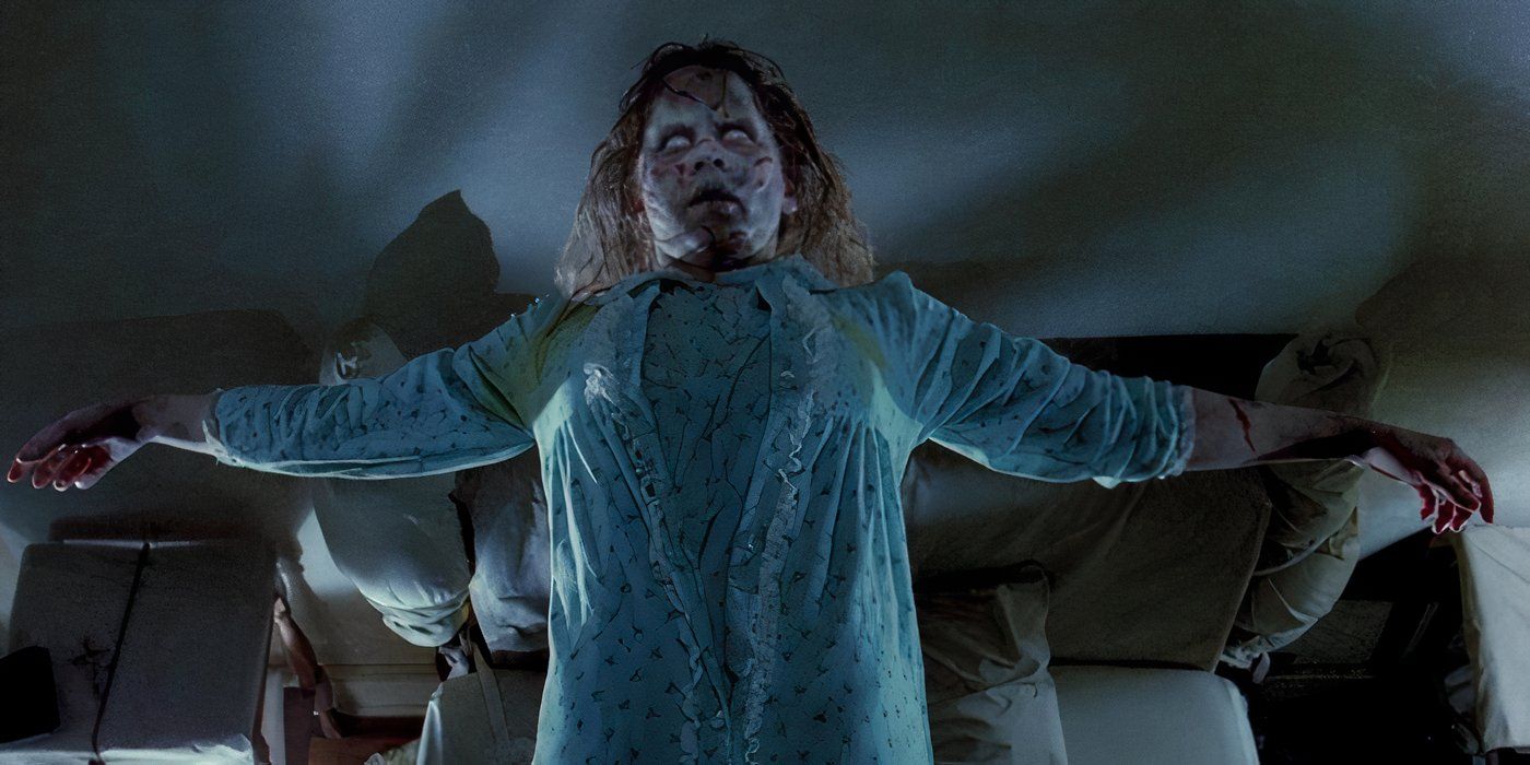 Linda Blair as the possessed Regan, hovering over a bed with her arms outstretched, in 