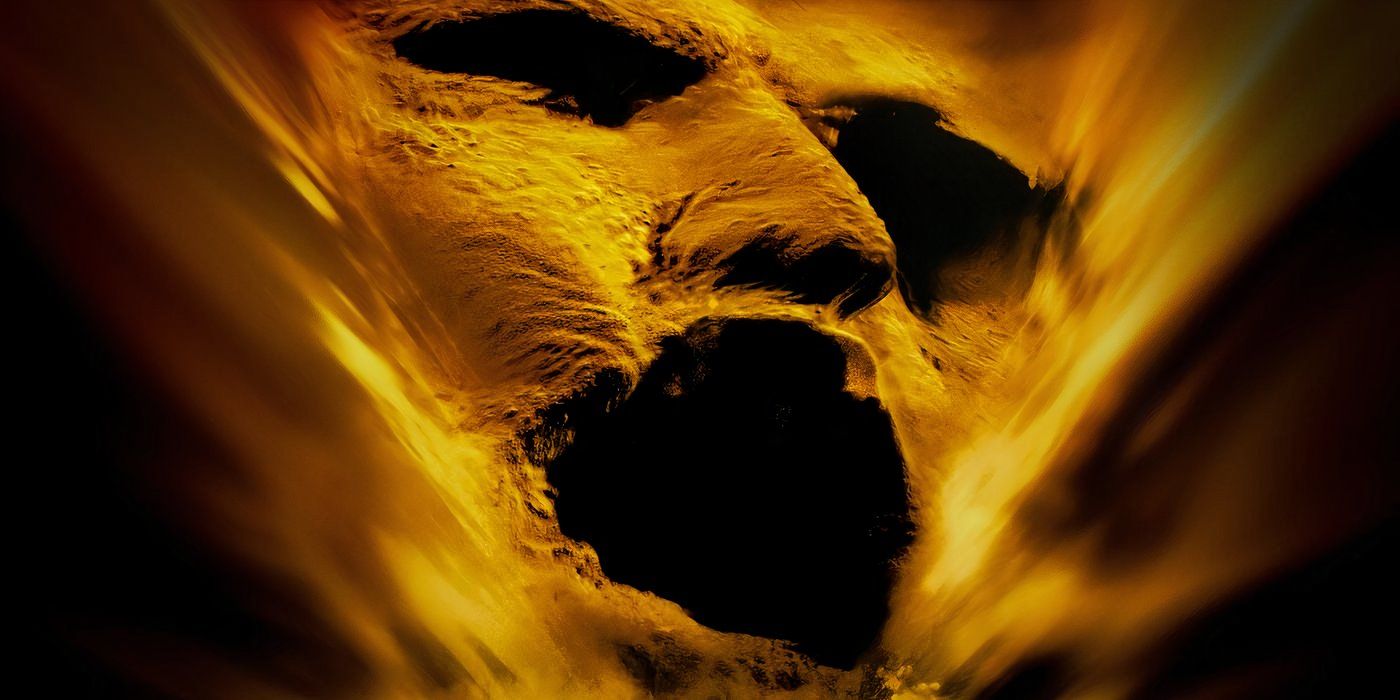 Promotional image for 'The Mummy' (1998) featuring a ghostly face in a sandy wind 