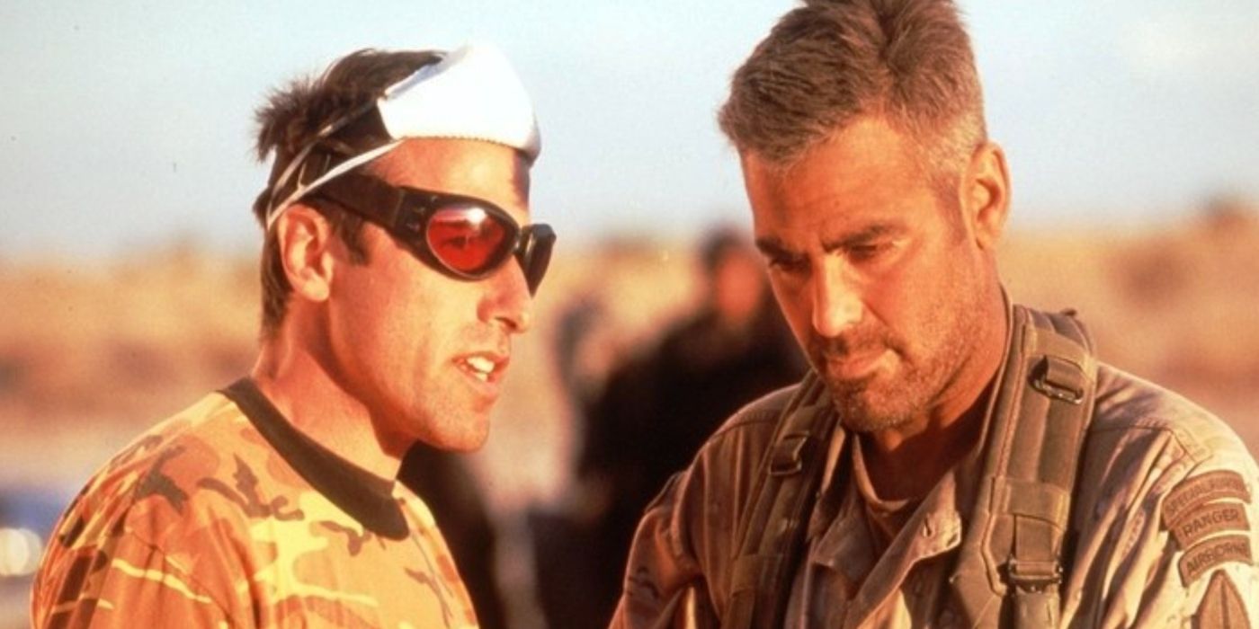 David O. Russell in conversation with George Clooney on the set of Three Kings