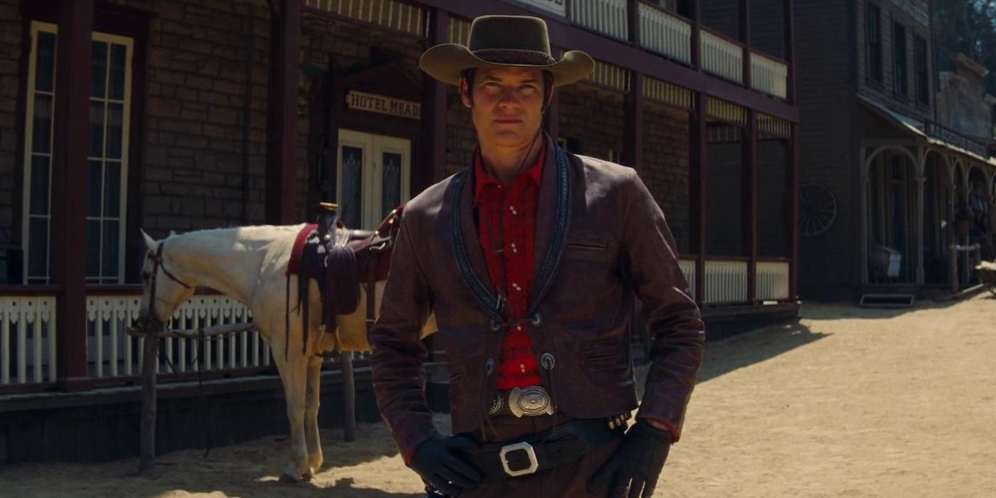 Actor James Stacy stands in a cowboy costume in Once Upon a Time&hellip; in Hollywood.