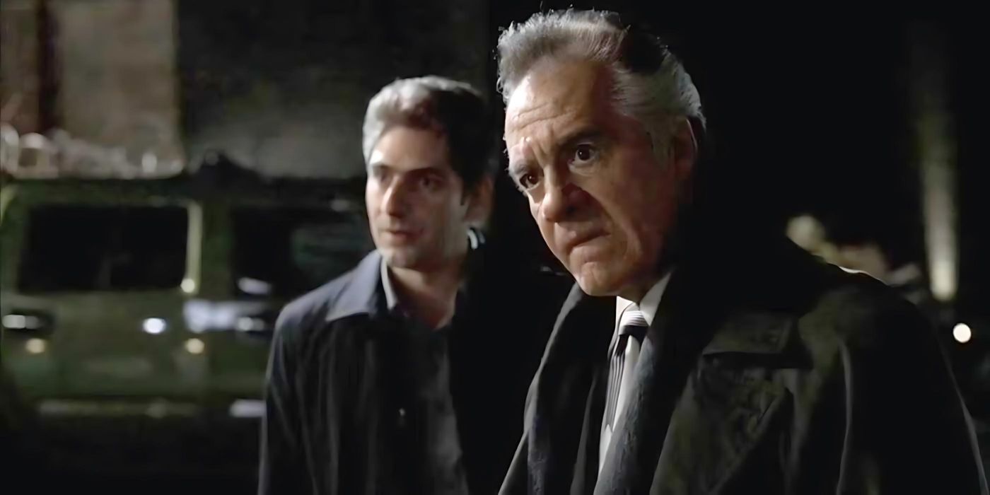 Tony Sirico as Paulie Gualtieri and Michael Imperioli as Christopher look off-screen at a waiter who has met them outside of restaurant to talk about his tip in The Sopranos
