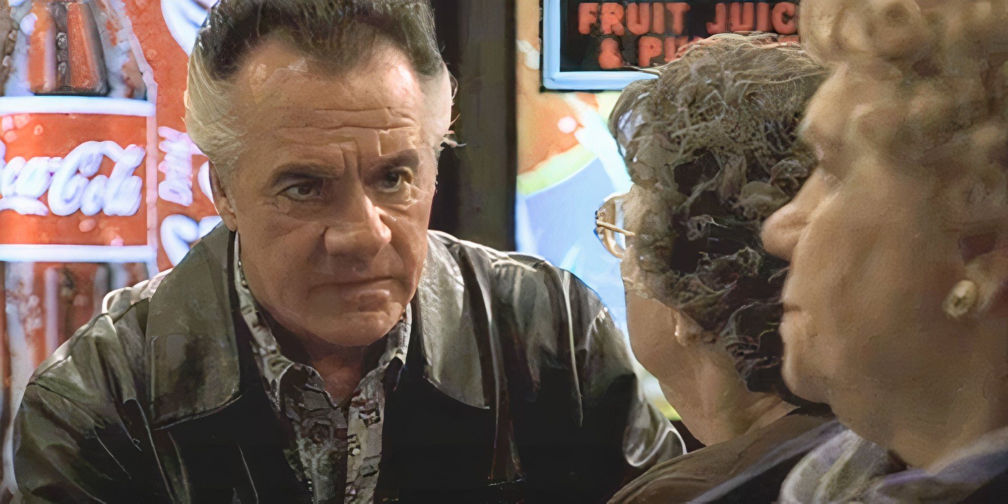 Tony Sirico looking at Frances Esemplare and Fran Anthony in The Sopranos