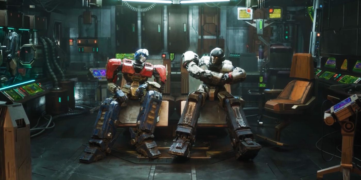 Orion sitting casually next to D-16 whose arms are crossed angrily in command room