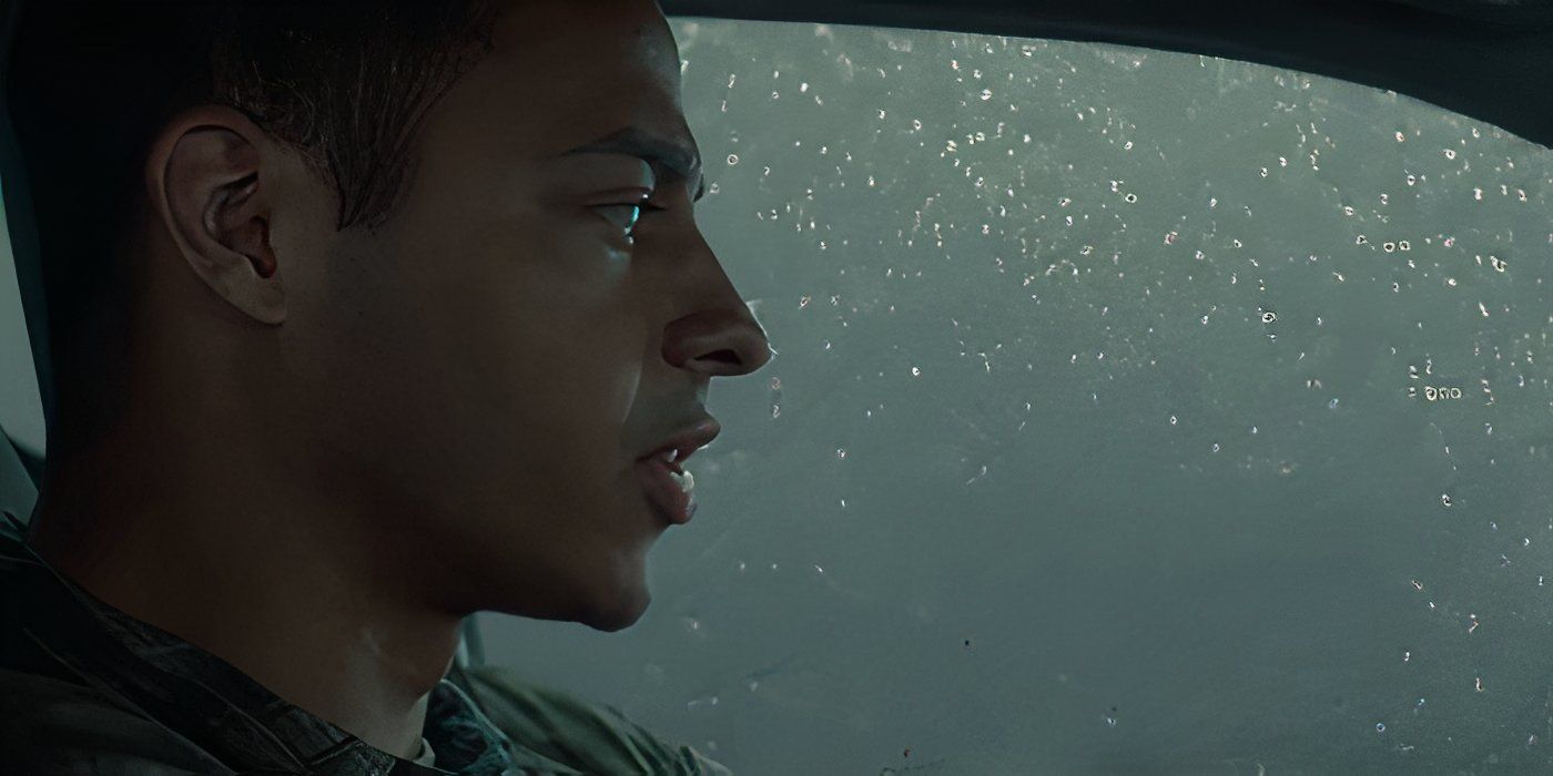 Daryl McCormack as Jeb driving a car through the rain in Twisters