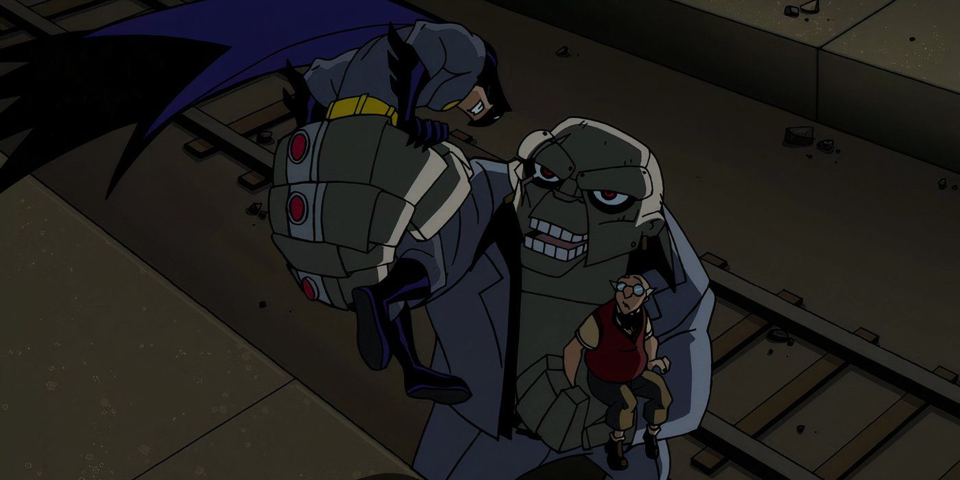 The Ventriloquist holding up Batman in one hand and carrying Arnold Wesker in the other in The Batman