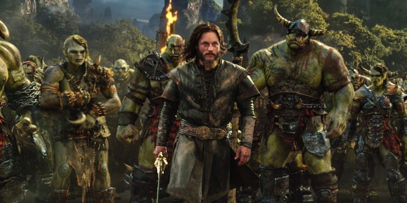 A human warrior leading an army or orcs in Warcraft