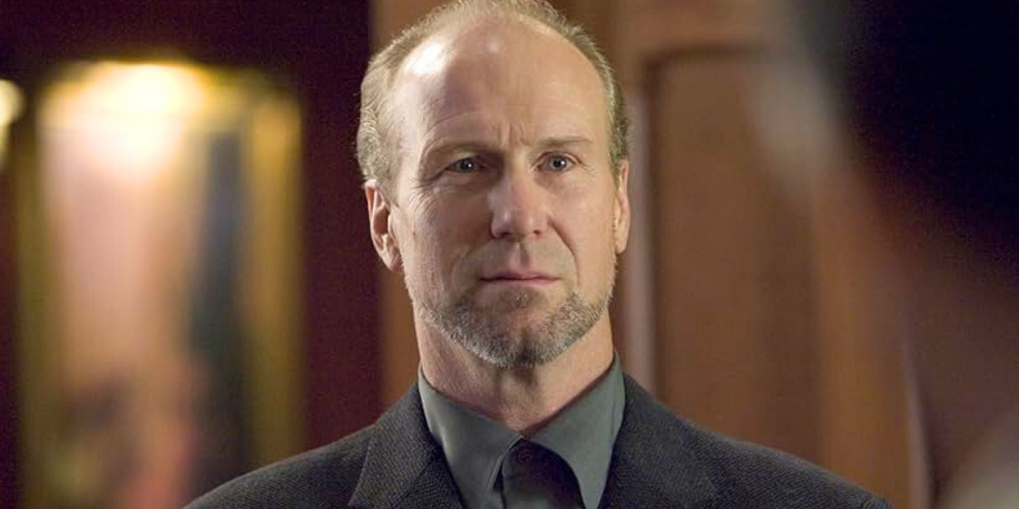 William Hurt smirking softly in A History of Violence (2005)