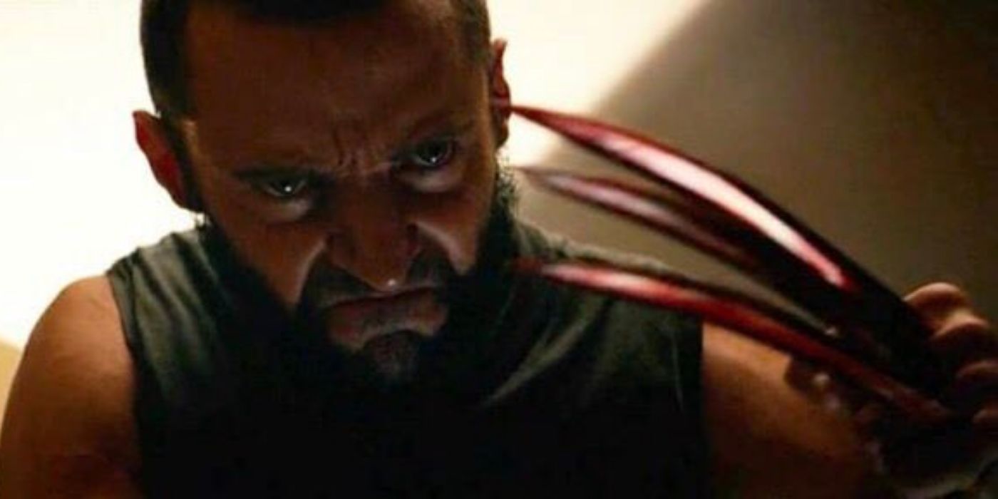 Hugh Jackman as X-24 with an angry face and bloody claws in Logan