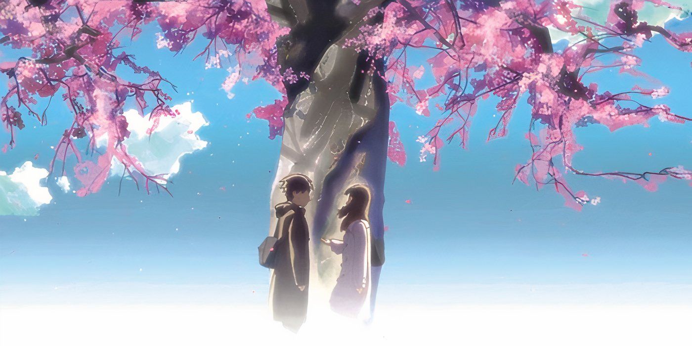 Takaki and Akari stand in front of each other underneath a flowering cherry blossom tree in '5 Centimeters per Second'