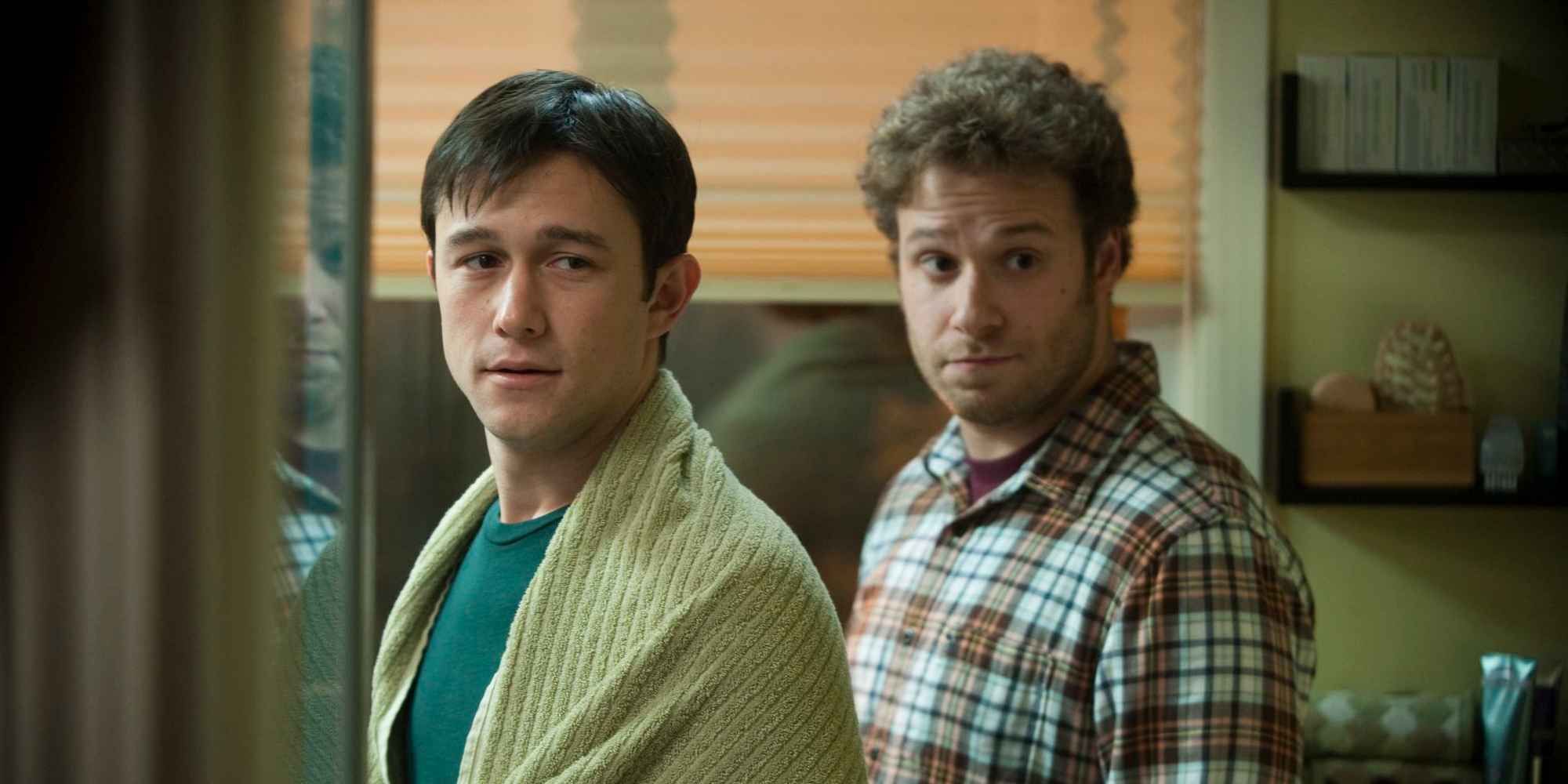 Joseph Gordon-Levitt and Seth Rogen standing next to each other in 50/50.