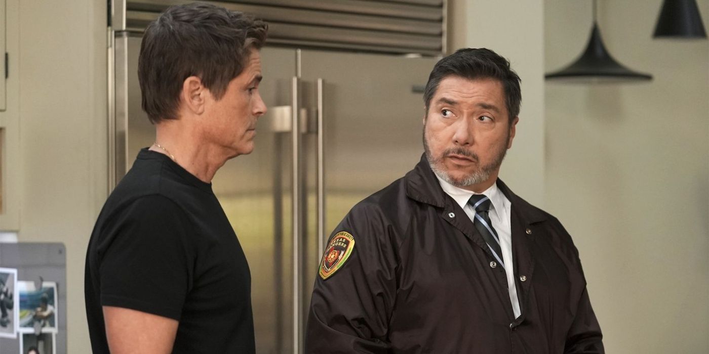 Owen (Rob Lowe) and Gabriel (Benito Martinez) talk in front of a large fridge