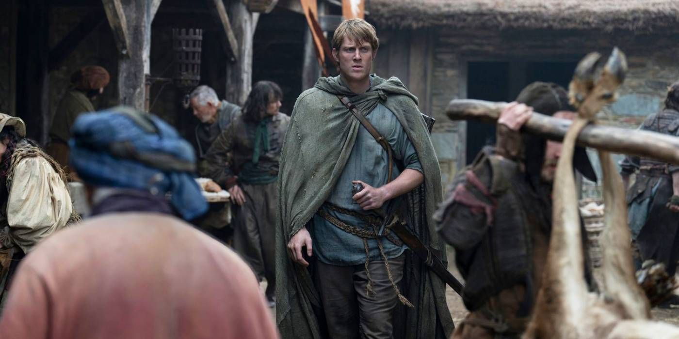 Peter Claffey as Ser Duncan walking through a crowd of people in A Knight of the Seven Kingdoms