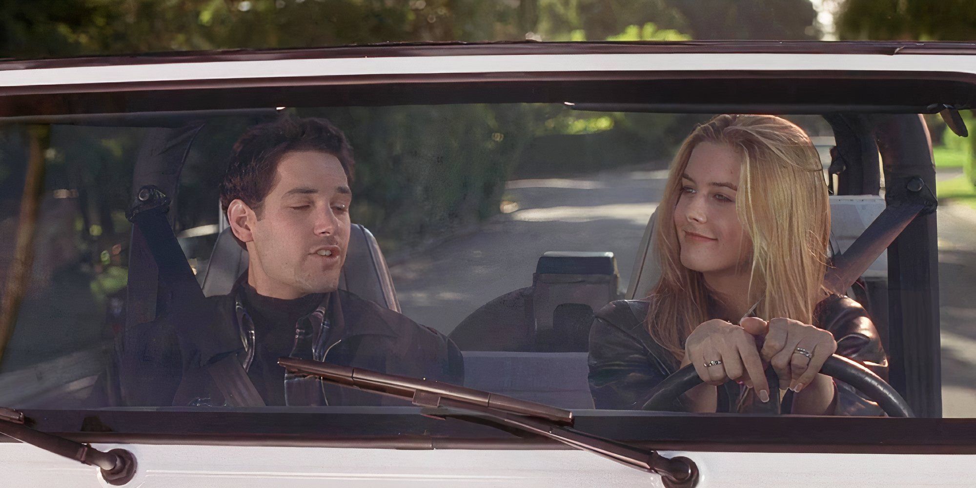 Alicia Silverstone as Cher and Paul Rudd as Josh in Clueless inside a car
