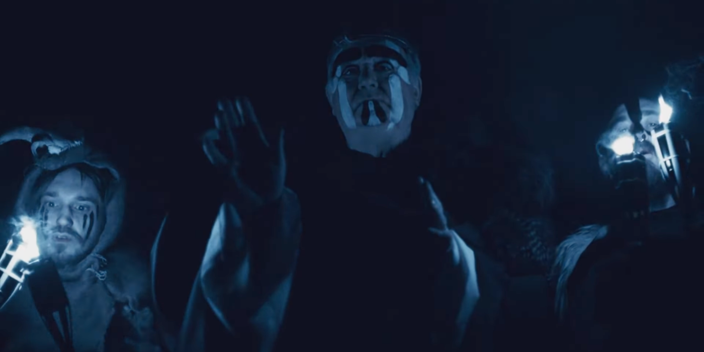 Pagans with painted faces perform a ritual in 'All You Need Is Death'