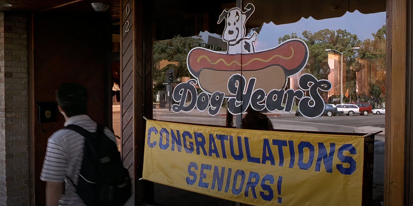 Dog Years Front Window With a Banner Saying &ldquo;Congratulations, Seniors!&quot;