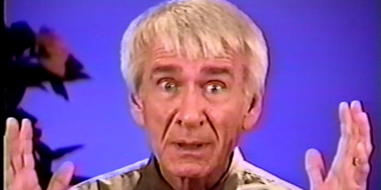 Marshall Applewhite talks to the camera in a video show in Heaven's Gate