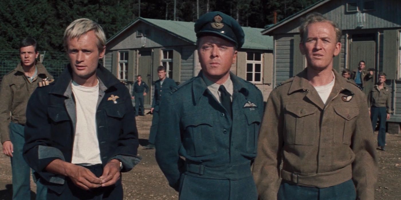 Ashley-Pitt (David McCallum), MacDonald (Gordon Jackson), and Bartlett (David Attenborough) standing together in 'The Great Escape'