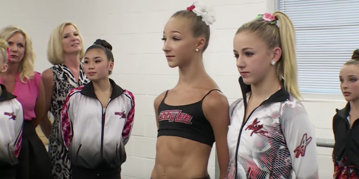 Ava Mitchell and Chloe Lukasiak stand side by side during pyramid on 'Dance Moms'