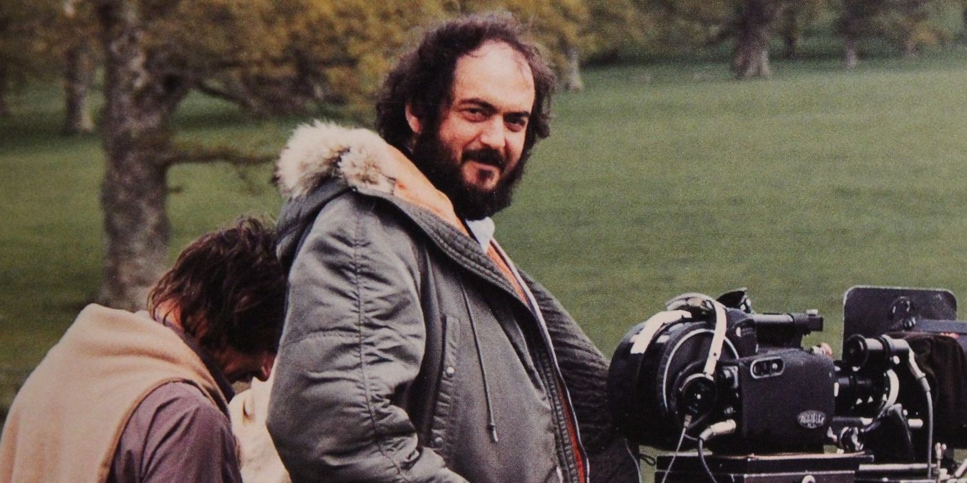 Stanley Kubrick smiling on the set of Barry Lyndon