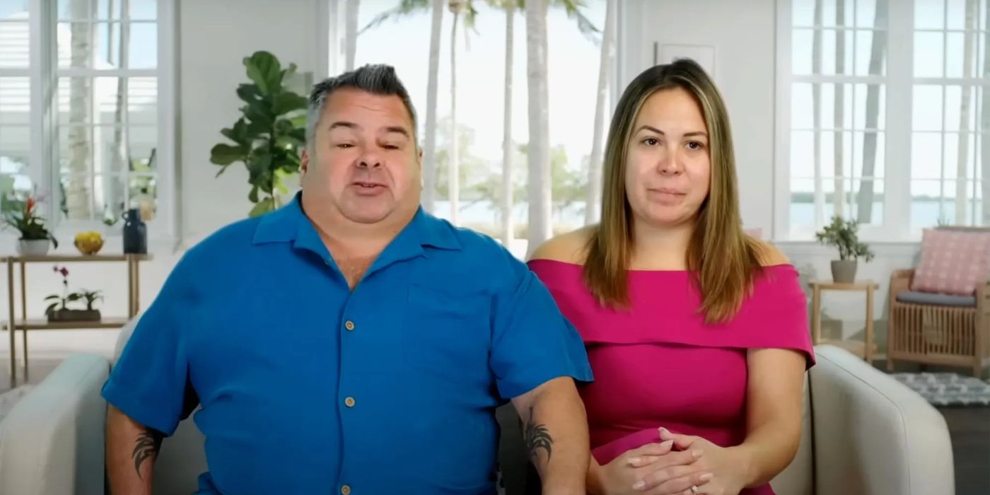 Big Ed and Liz from 90 Day Fiance sit on a couch