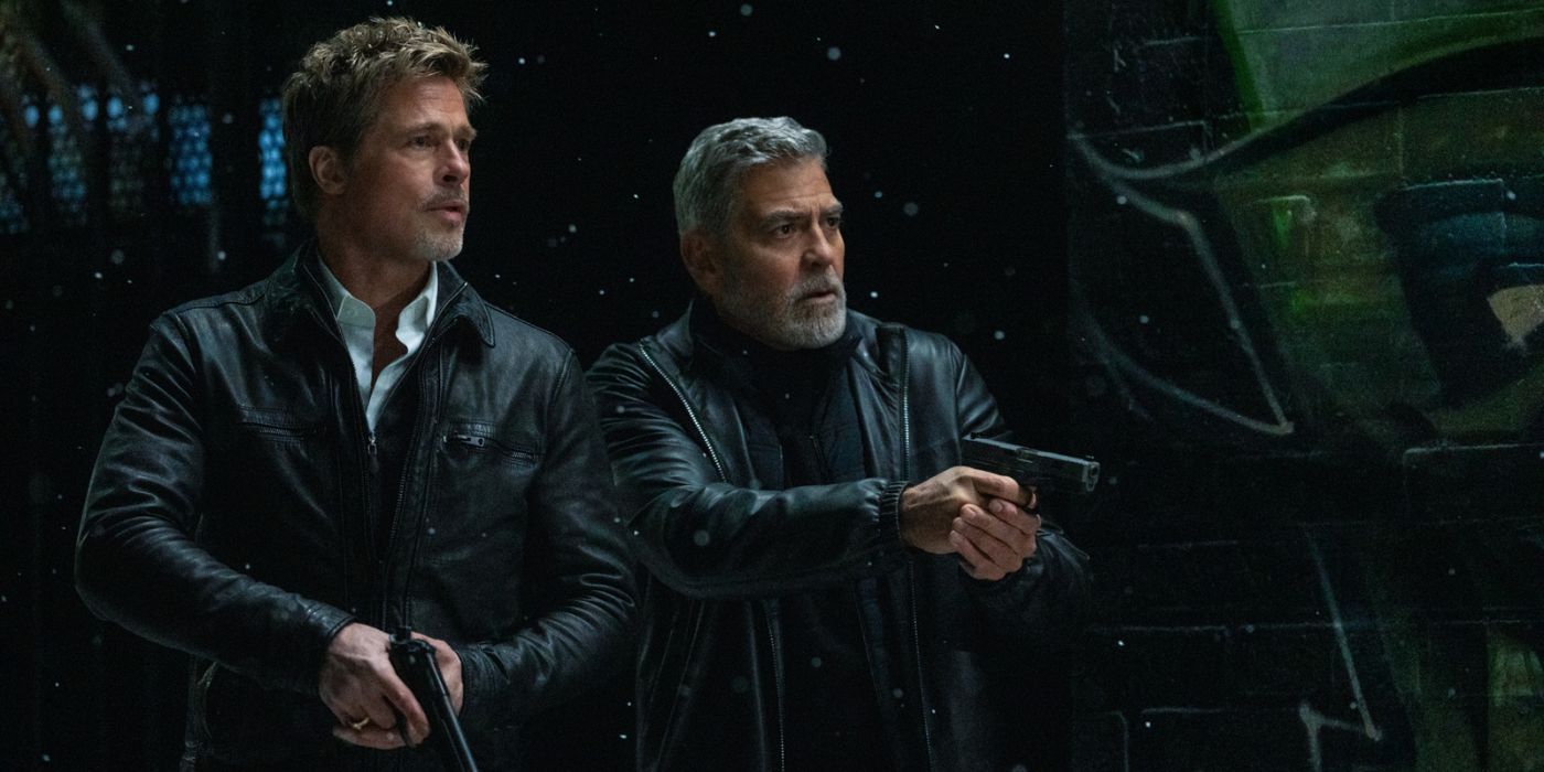 In “Wolfs,” Brad Pitt and George Clooney wear black leather jackets and hold guns.